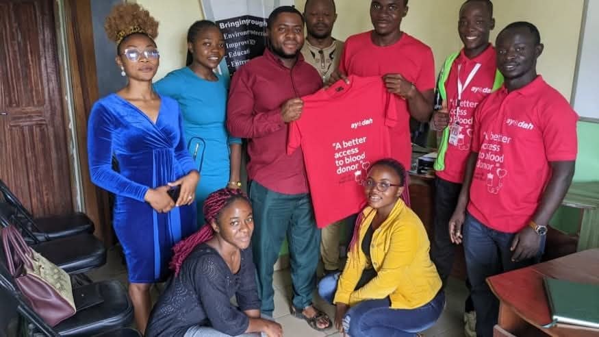 Ayodah volunteers in branded shirts during a community donor drive.